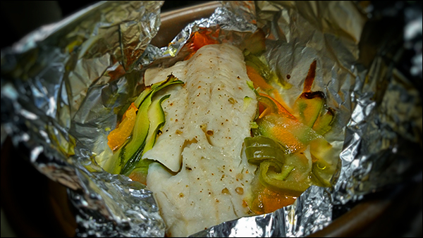 Merluza en papillote con verduras